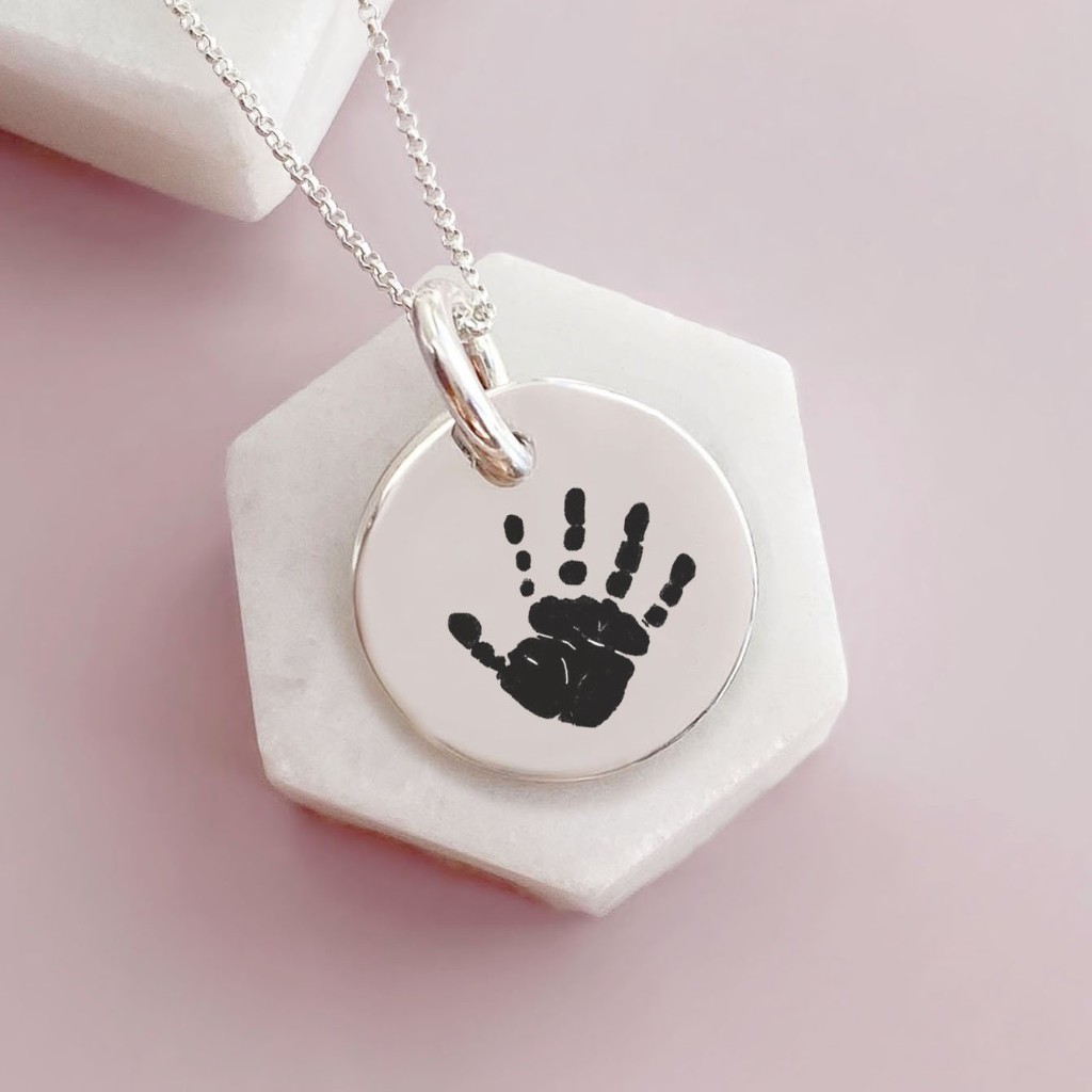 Silver handprint pendant necklace
