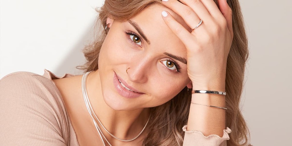 Woman wearing silver jewelry